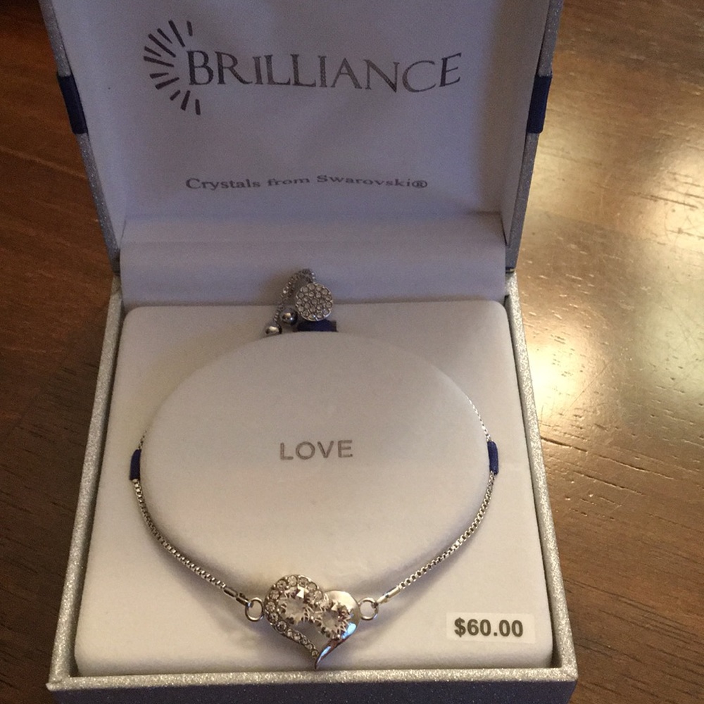 Fine silver plated heart bracelet. New in box